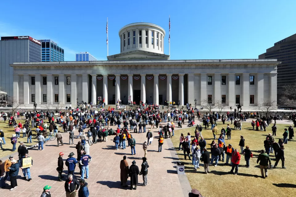 A photo of protesters on the front lawn of the Ohio Statehouse during the State of the Union speech by Governer Kasich.